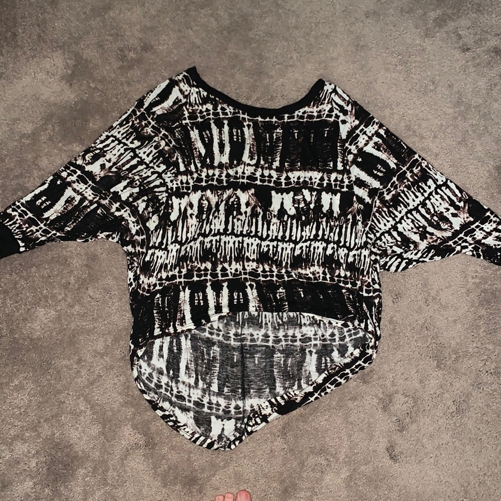 Abstract high/slow top